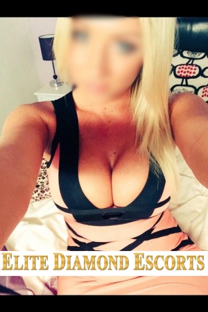 blonde maya takes a selfie showing off her huge cleavage